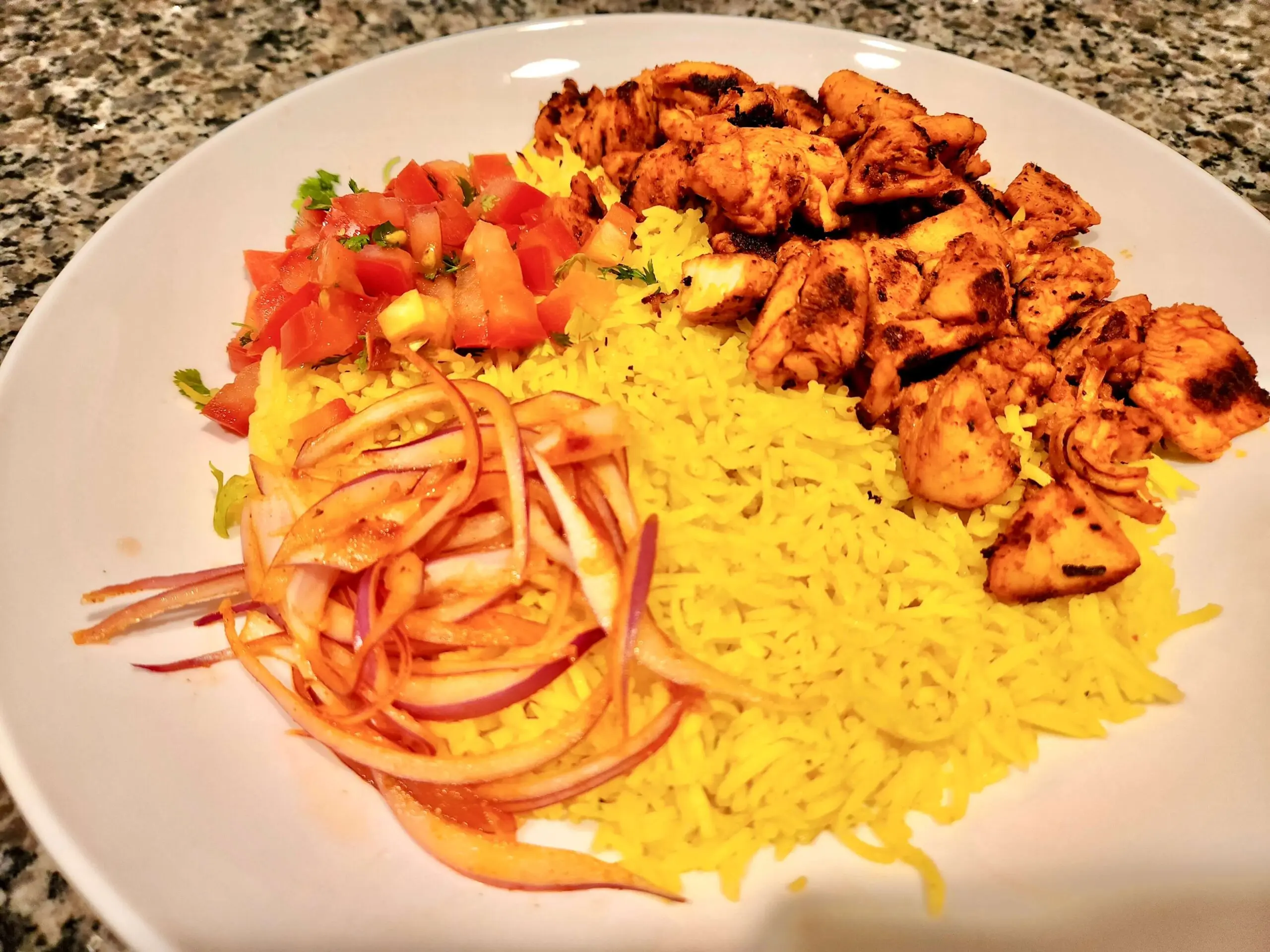 Mediterranean Chicken and Rice with Spicy Onions and Tomato Salad